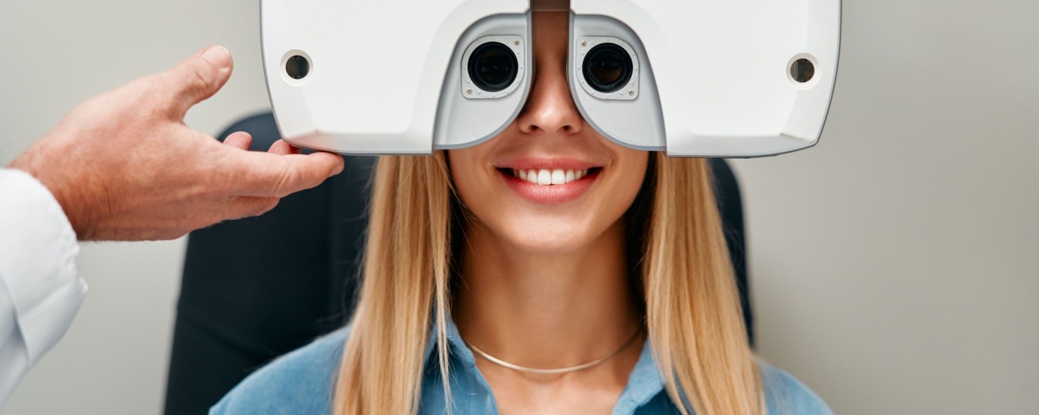 Young female with eye doctor during eye exam.