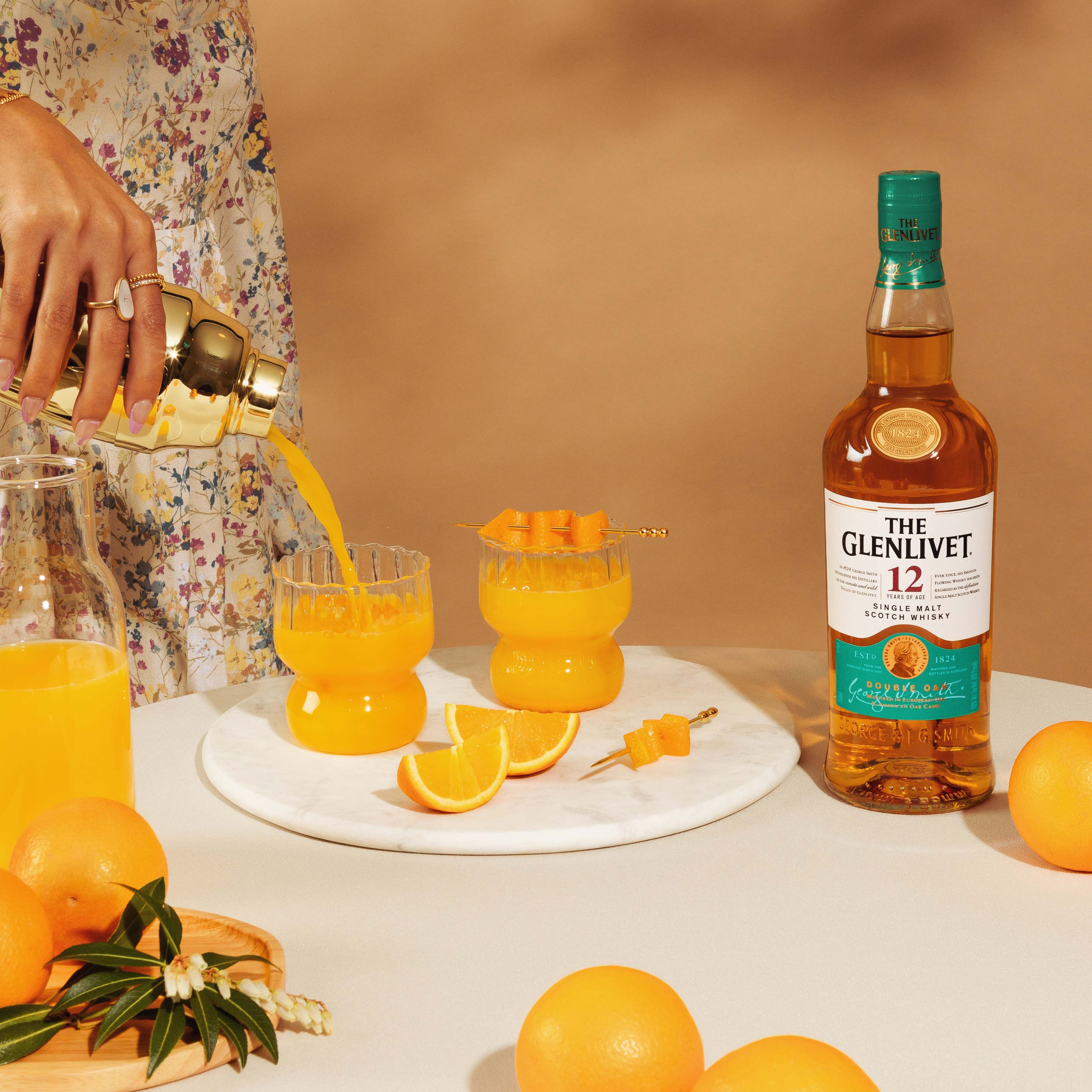 THE GLENLIVET 12 YO LIFESTYLE PHOTOGRAPHY WITH BOTTLE TURMERIC 1X1.jpg