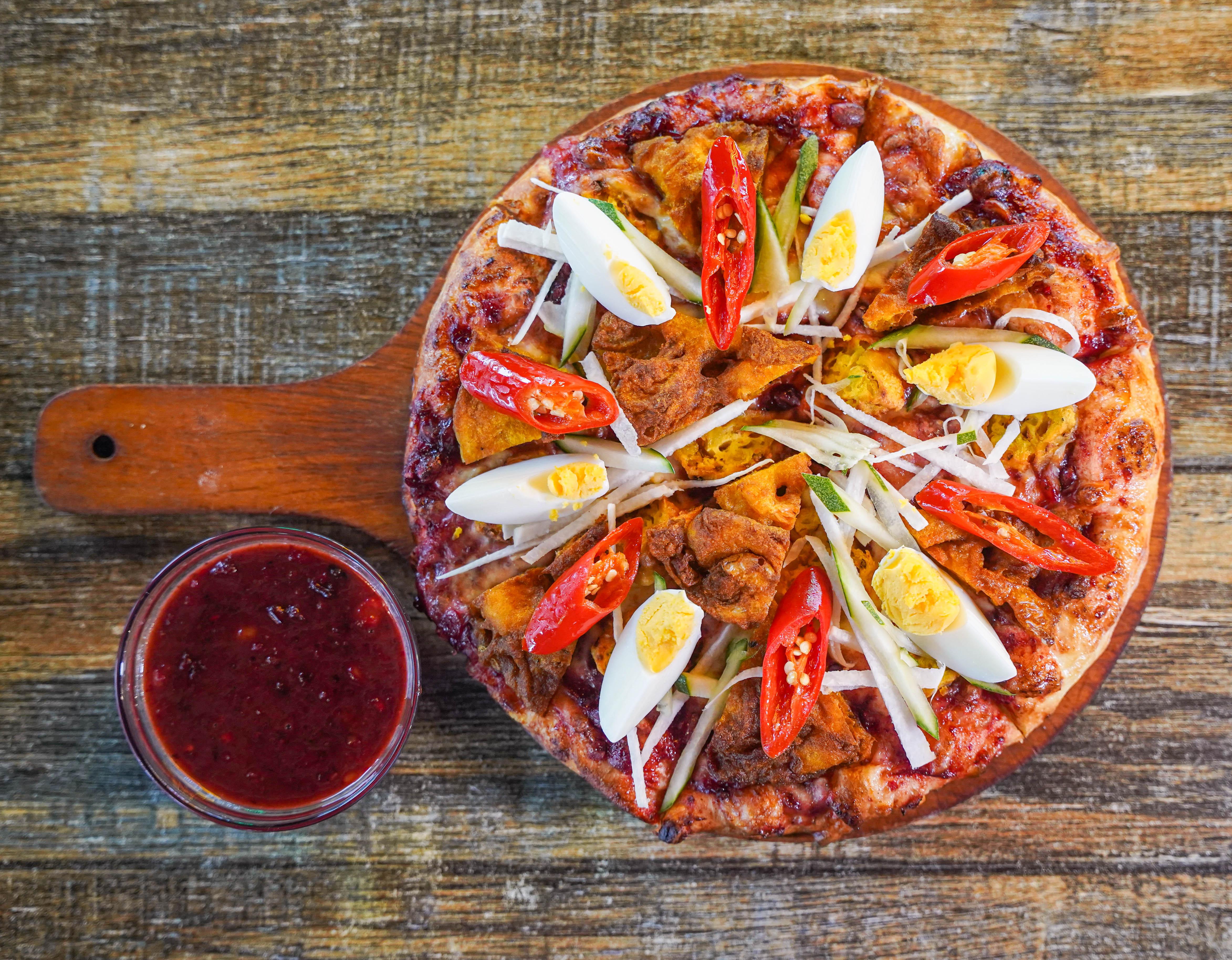 us pizza makes malaysian pizza history with limited-time pasembur pizza & lunch deals