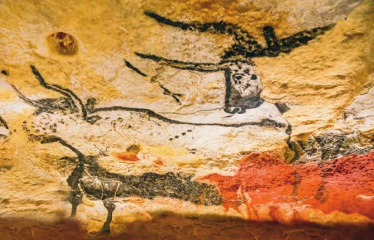 Imagem de pictogramas feitos no interior de uma caverna. Os pictogramas representam dois touros.