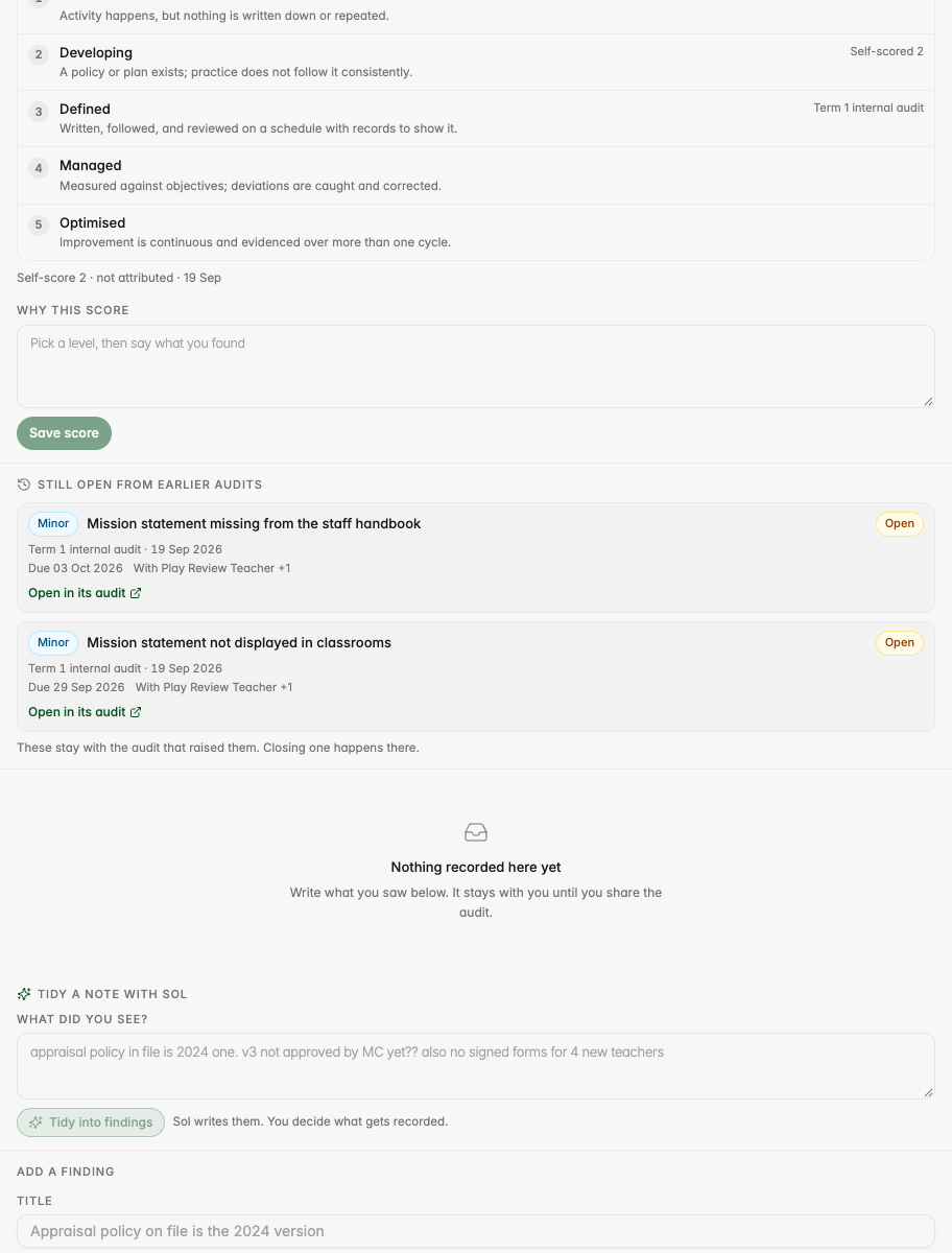 The score step: rubric rungs with the self-score and last audit marked, and the reason box.