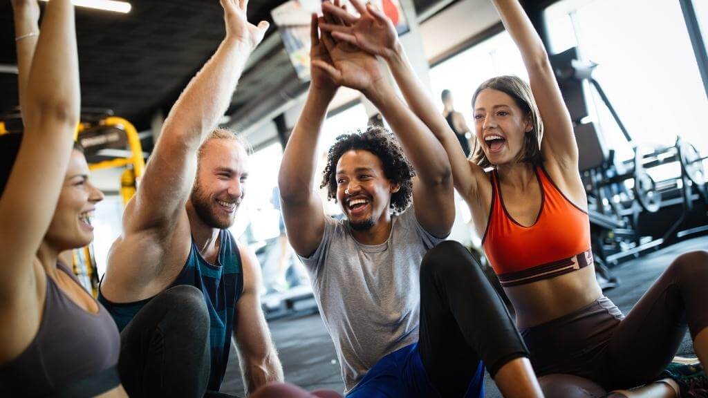 Friends celebrating after workout