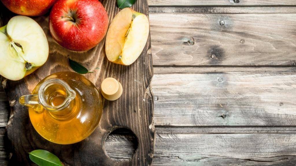 Fresh apples and apple cider vinegar