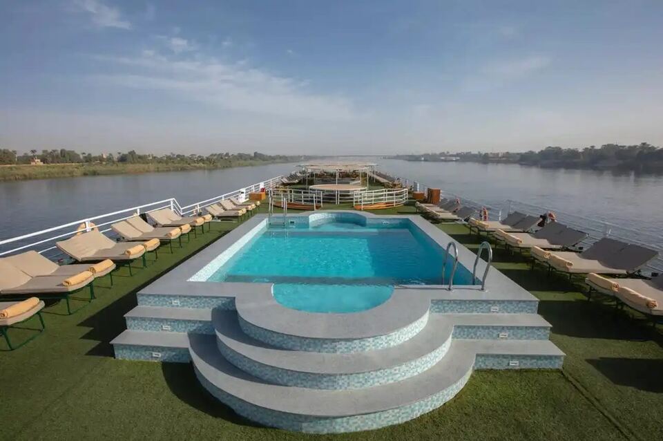 The sun deck pool, with the shaded bar beyond