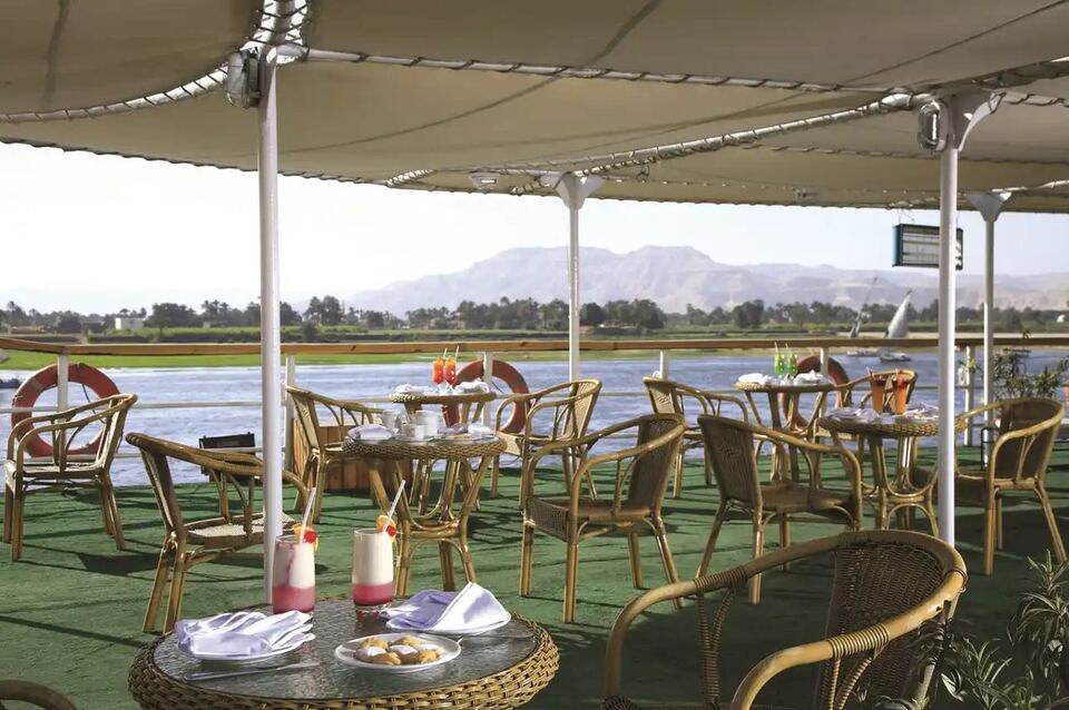The shaded sun deck, with the Theban hills across the river