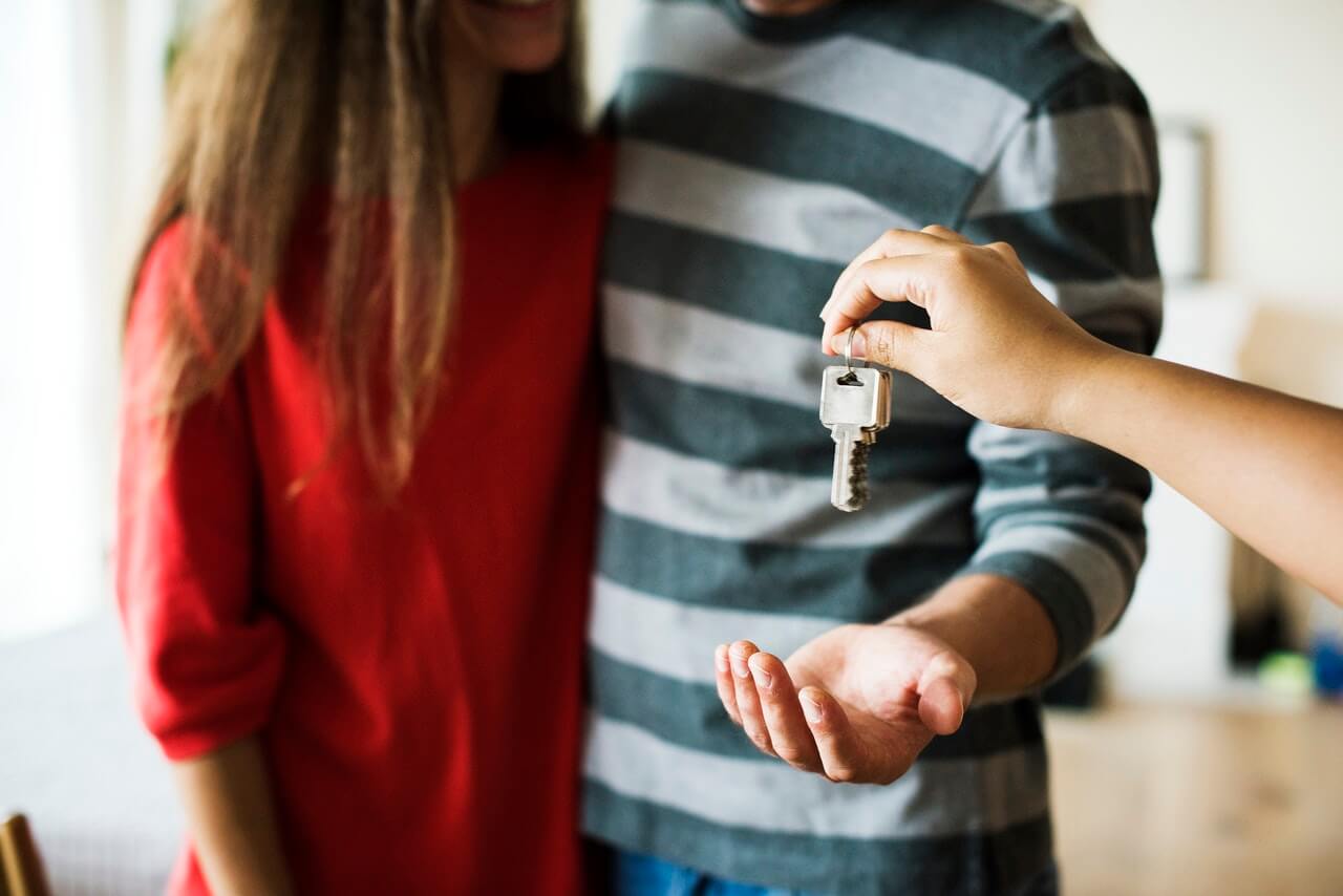 Keys being handed over to new owners