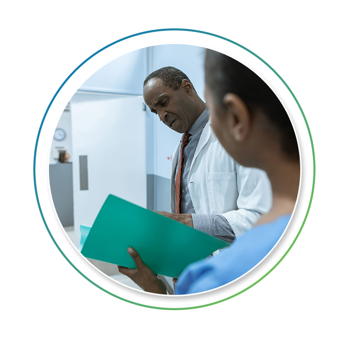 Healthcare professionals reviewing clinical trial materials together