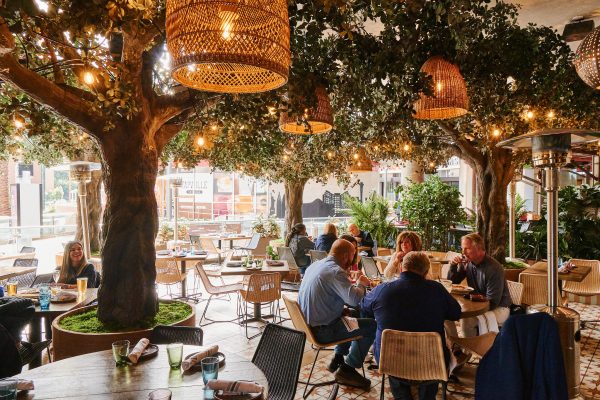 People dining on El Segundo Sol patio, available for seating on Father's Day