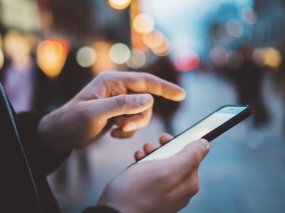 InteractOut: Leveraging Interaction Proxies as Input Manipulation Strategies for Reducing Smartphone Overuse