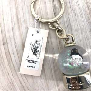 Louis Vuitton Penguin Fur bag charm or key chain, Luxury