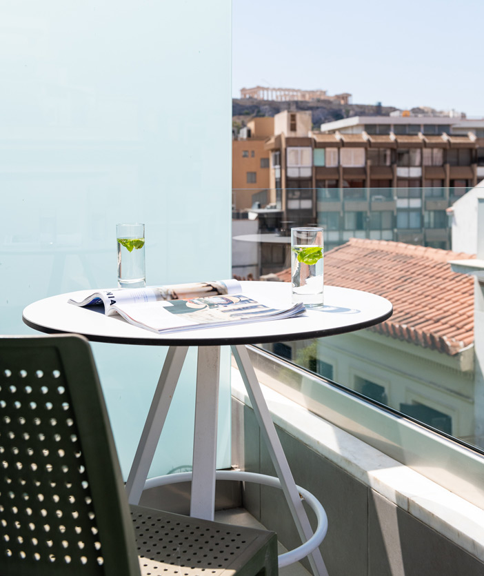 Enattica Suites, balcony with a table