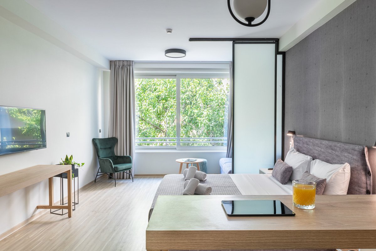 Enattica Suites, comfortable room with double bed