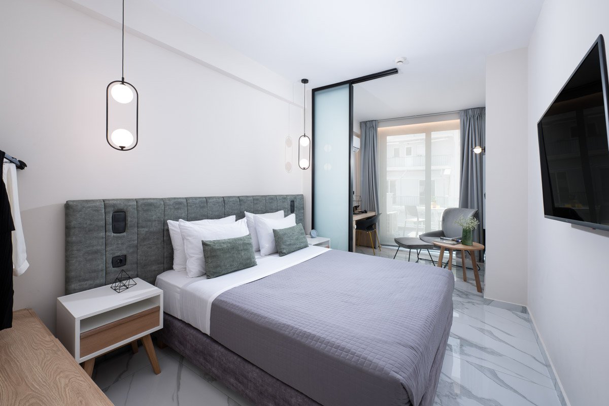 Enattica Suites, comfortable room with double bed