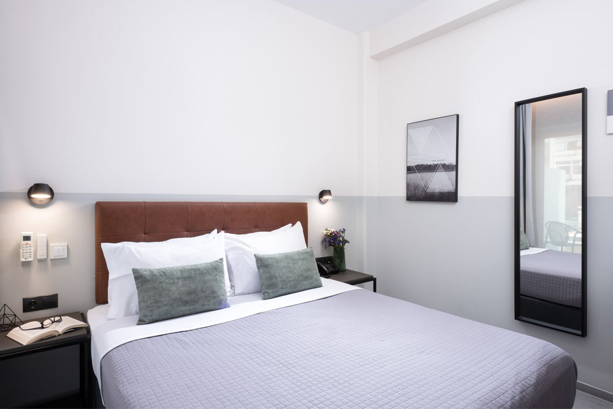 Enattica Suites, comfortable room with double bed