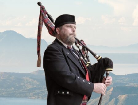 The Highland Bagpiper