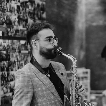 Hire Lewis Sallows Saxophonist with Encore