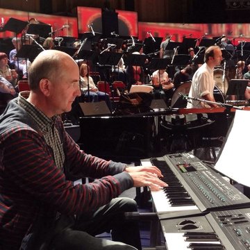 Hire Adrian Sutcliffe Musical director with Encore