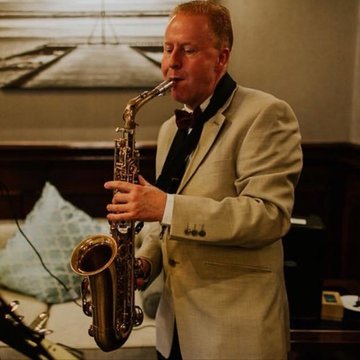 Hire Tim Clarke The Sax Man Soprano saxophonist with Encore