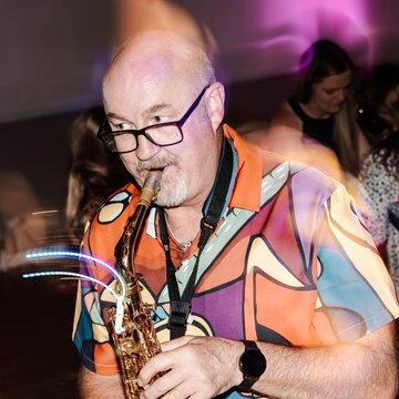 Dave:  The Sax's profile picture