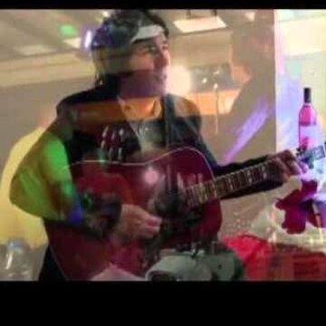 Hire Paul Keogh Singing guitarist with Encore