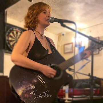 Hire Jodie Rose Singing guitarist with Encore