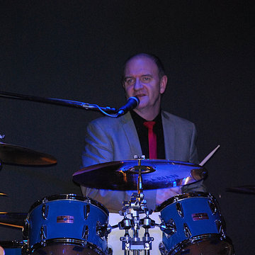 Hire Paul Aitken Drummer with Encore