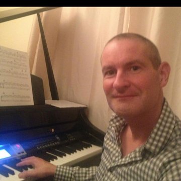 Hire Paul Carroll Music Pianist with Encore