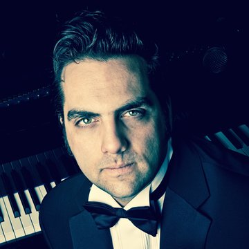 Hire Daniel Nathan Benisty Singing pianist with Encore