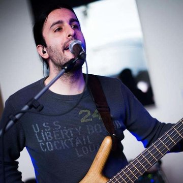 Hire Antonis Mikelis Bass guitarist with Encore