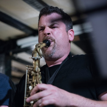 Hire Kerry Williams Baritone saxophonist with Encore