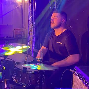 Hire Kyle Worrall Drummer with Encore