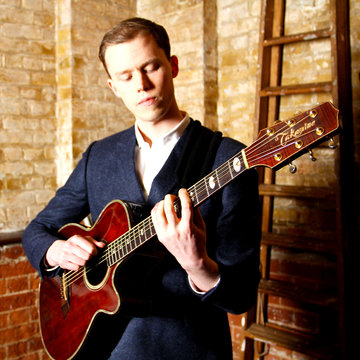 Hire Sean Ahern Classical guitarist with Encore