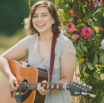 Hire Holly Clare Singing guitarist with Encore