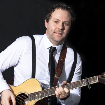 Hire Rick Taylor Singing guitarist with Encore