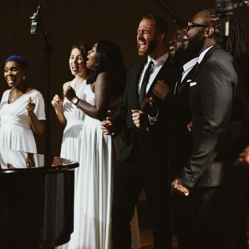 Hire BIG Gospel Choir Singing waiters with Encore