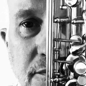 Hire Alec Wares Bass clarinettist with Encore