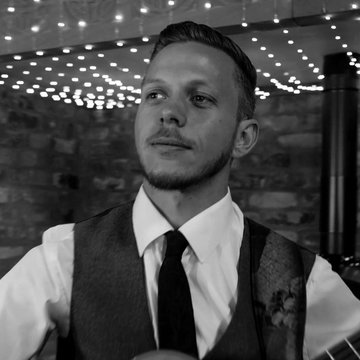 Hire Adam Towers Classical guitarist with Encore