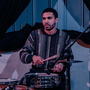 Hire Zach Okonkwo Drummer with Encore