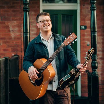 Hire Evan Davies Electric guitarist with Encore