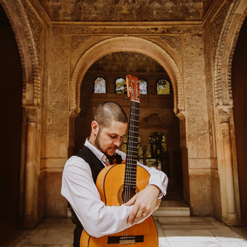 Hire Samuel Moore Classical guitarist with Encore