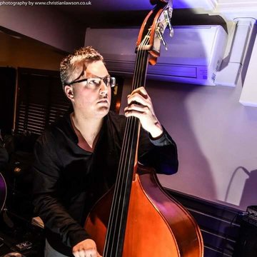 Hire Joe Limburn Double bassist with Encore