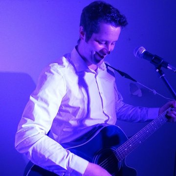 Hire Martin John Singing guitarist with Encore