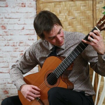 Hire Scott Robertson Classical guitarist with Encore