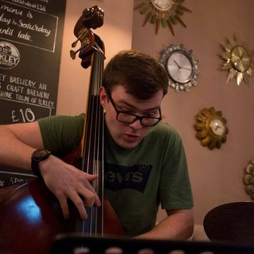 Hire Jack Garside Double bassist with Encore