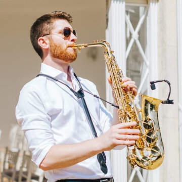 Hire James Burwell Saxophonist with Encore