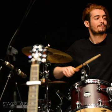 Hire Alberto Christodoulou Drummer with Encore