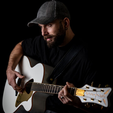 Hire Andrew Cox Singing guitarist with Encore