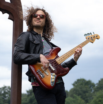 Hire Matteo Grassi Bass guitarist with Encore