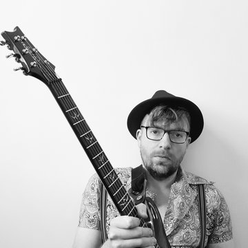 Hire Joel White Singing guitarist with Encore