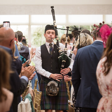 Hire John Gillies Bagpiper with Encore